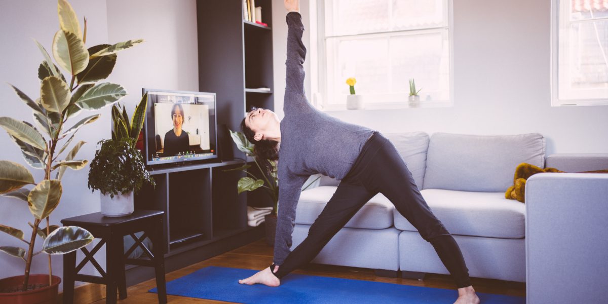 Privacy and pyjamas: Why doing online yoga at home is catching on