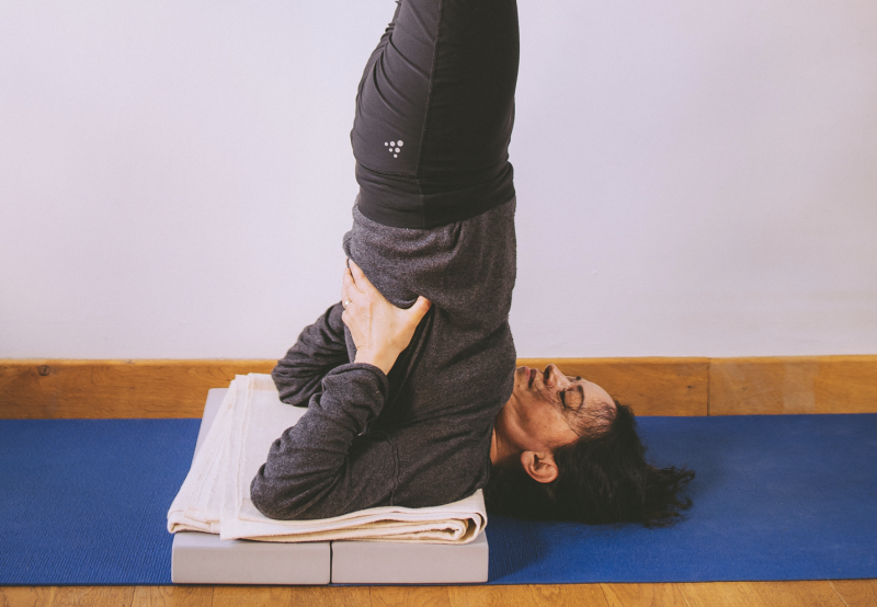 Shoulderstand modifications and variations with a bolster - Body